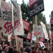 Writers_raise_signs_at_wga_rally_crop_summarysize.jpg